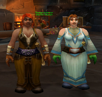 Two dwarf women (Thymine and Adenine) stand next to each other.