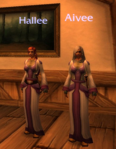 Two female human priests posing, with the names Hallee and Aivee.