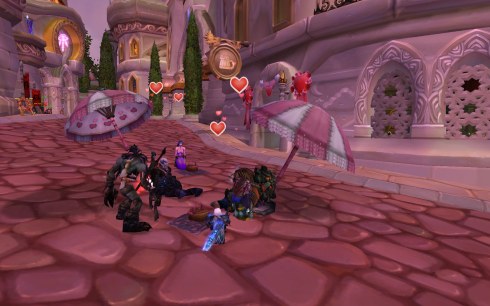 Mishaweha sits with others (including Alliance) in Dalaran, around picnic blankets.